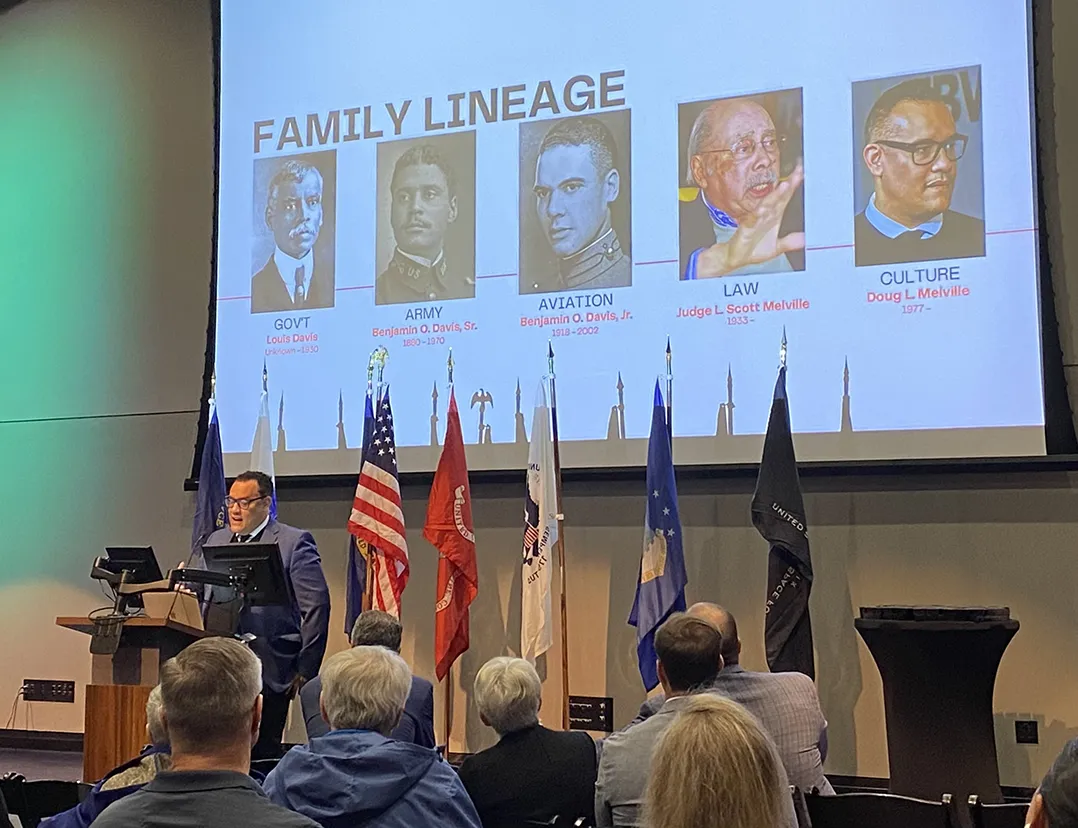 Author presents family military history during Fishers Veterans Day event